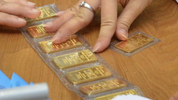 Giá vàng giảm mạnh ngày 24 - 10: Thị trường biến động khó lường - Ảnh 1.